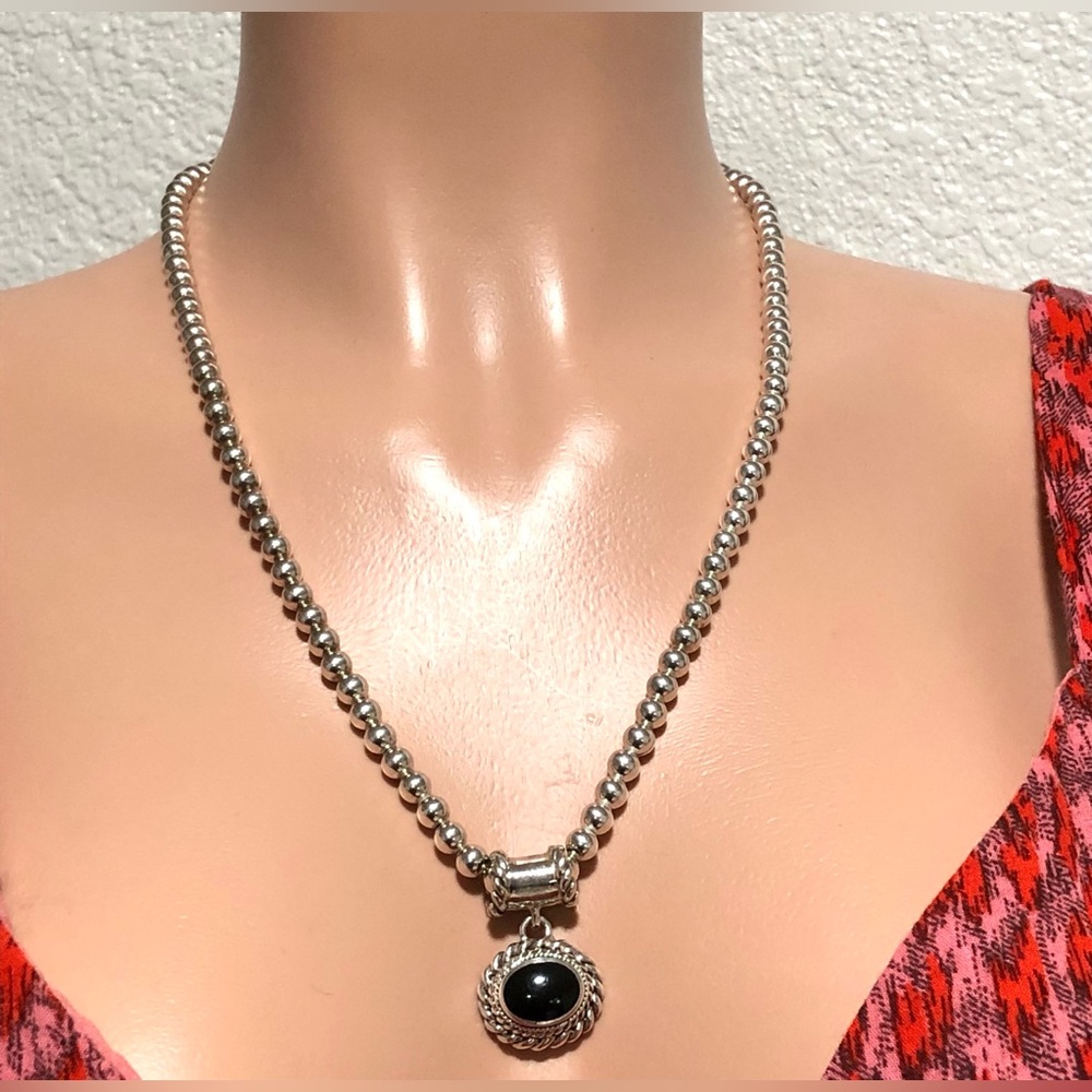 Elegant Silver Necklace with Black Pendant
